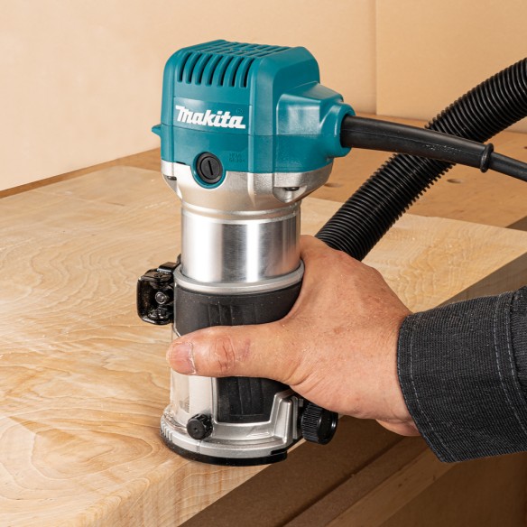 Fresadora multifunción Makita RT0702C - 710 W, pinzas 6/8 mm, carcasa de aluminio, arranque suave