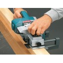 Raboteuse électrique Makita 1100 - 750W - 82 mm, rabotage profond jusqu'à 3 mm, robuste pour les travaux lourds.