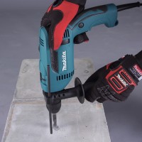 Perceuse à percussion Makita HP1641K1X 680 W - 16 mm, 0-2800 tr/min, coffret inclus 2