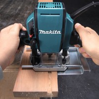 Défonceuse - Affleureuse Makita RP0900 - 900 W, compacte et légère pour le bois, pince 6/8 mm 2